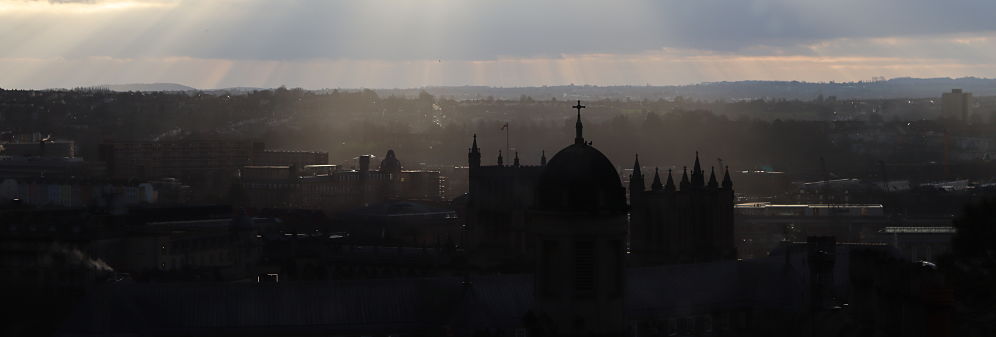 View from room 4.10 at the top of 35 Berkeley Square showing some of Bristol City spires and rooftops from above