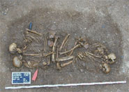 Group burial of a 4,600-year-old nuclear family, with the children (a boy of 8-9 and a boy of 5-4 years) buried facing their parents