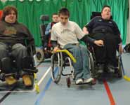 Young men with Duchenne muscular dystrophy playing hockey