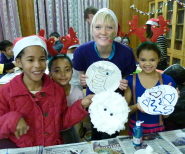 Children from the Saturday Club, a youth group run by Full Circle in St Pauls, with one of the UBU volunteers