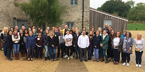 An outside picture of a collective group of Staff and students from the Centre of Academic Mental Health.